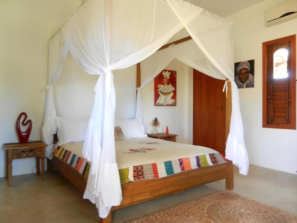 Quarto Deluxe com Varanda e Vista da Piscina