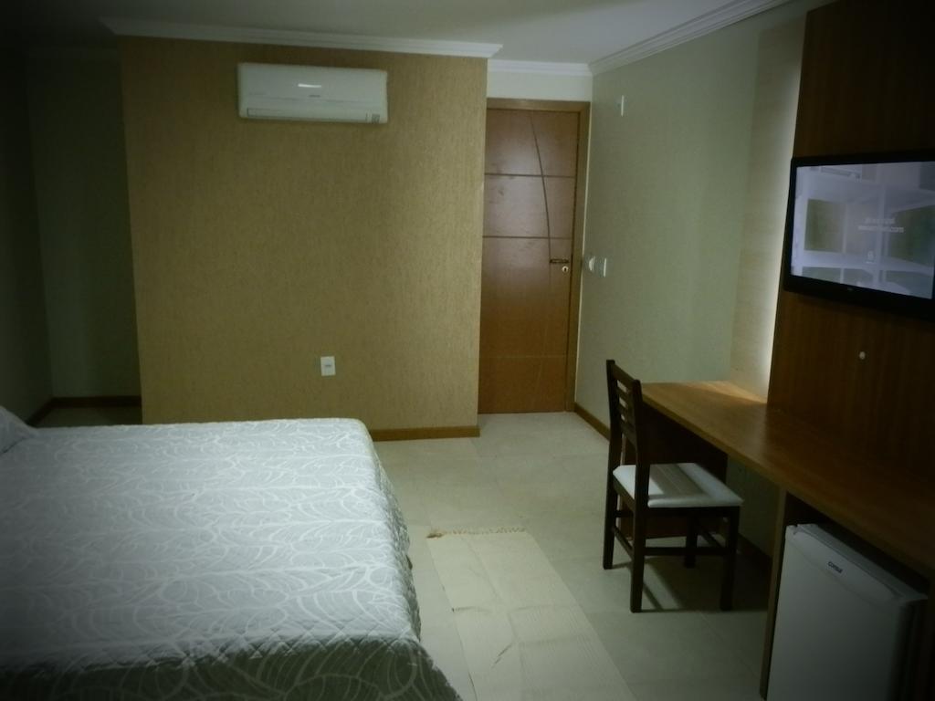 Quarto Deluxe (2 Adultos + 1 Criança)