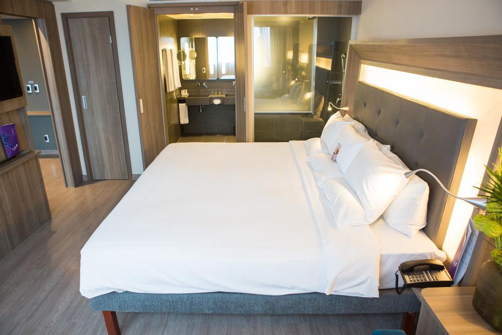 Executive Kamer met Queensize Bed en Uitzicht op Zee