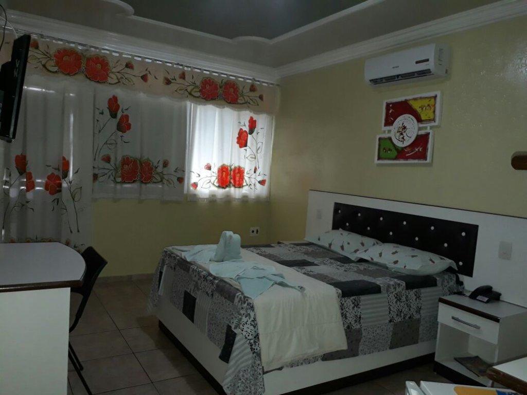 Quarto Duplo Deluxe (2 Adultos + 1 Criança)