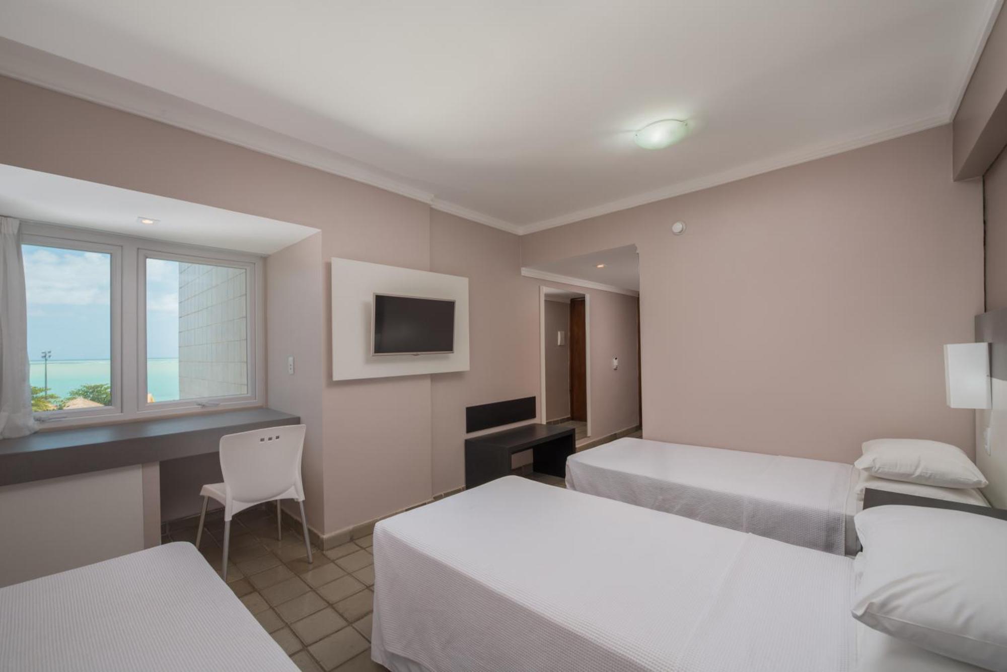 Quarto Duplo (2 Adultos + 1 Criança)