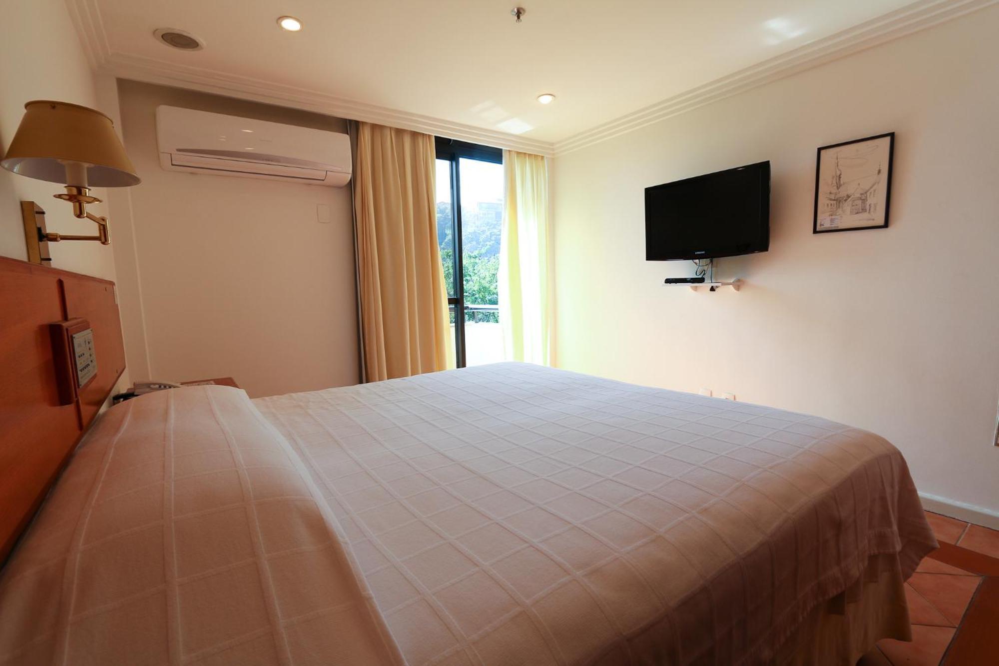 Quarto Duplo Executivo com Vista Lateral e Varanda