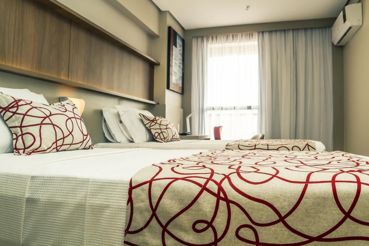 Quarto Executivo com 2 Camas de Solteiro