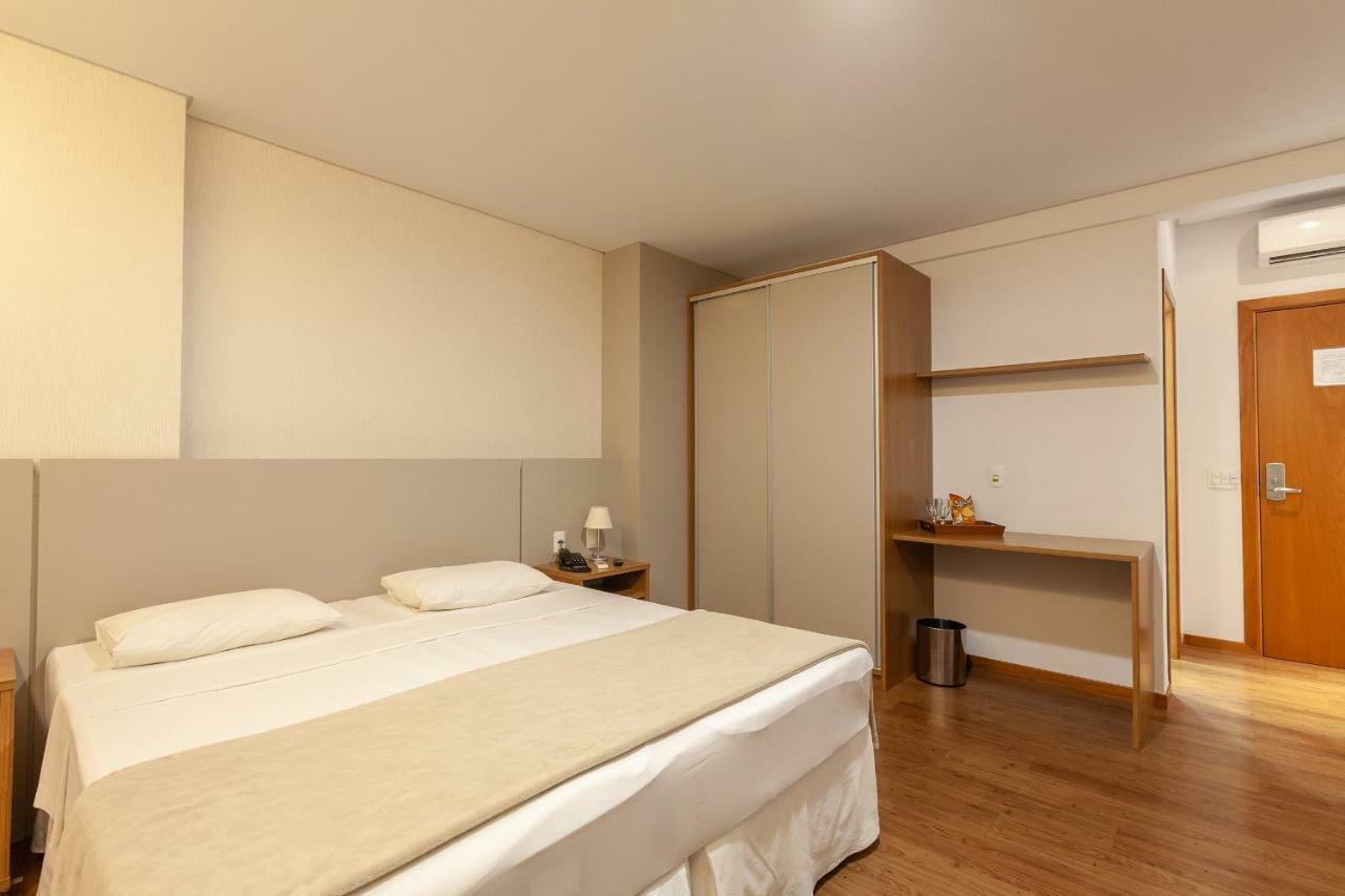 Quarto Duplo de Luxo com Cama de Casal