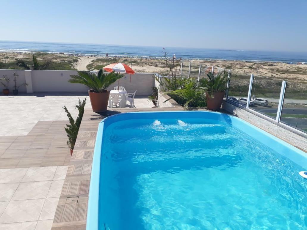 Quarto Quádruplo com Vista do Mar.