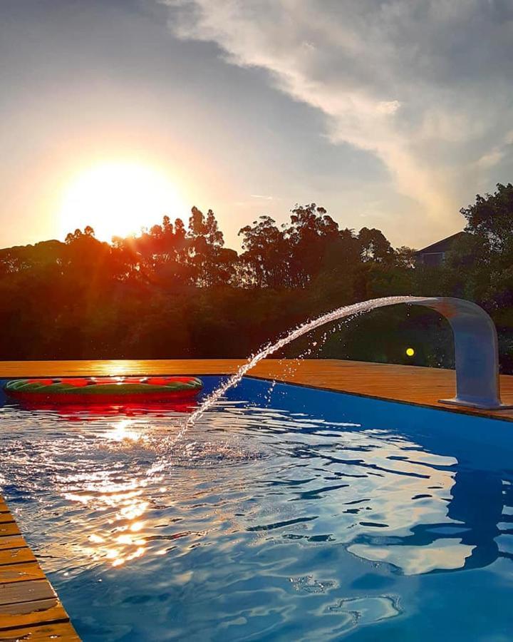 Suíte com Vista para a Piscina
