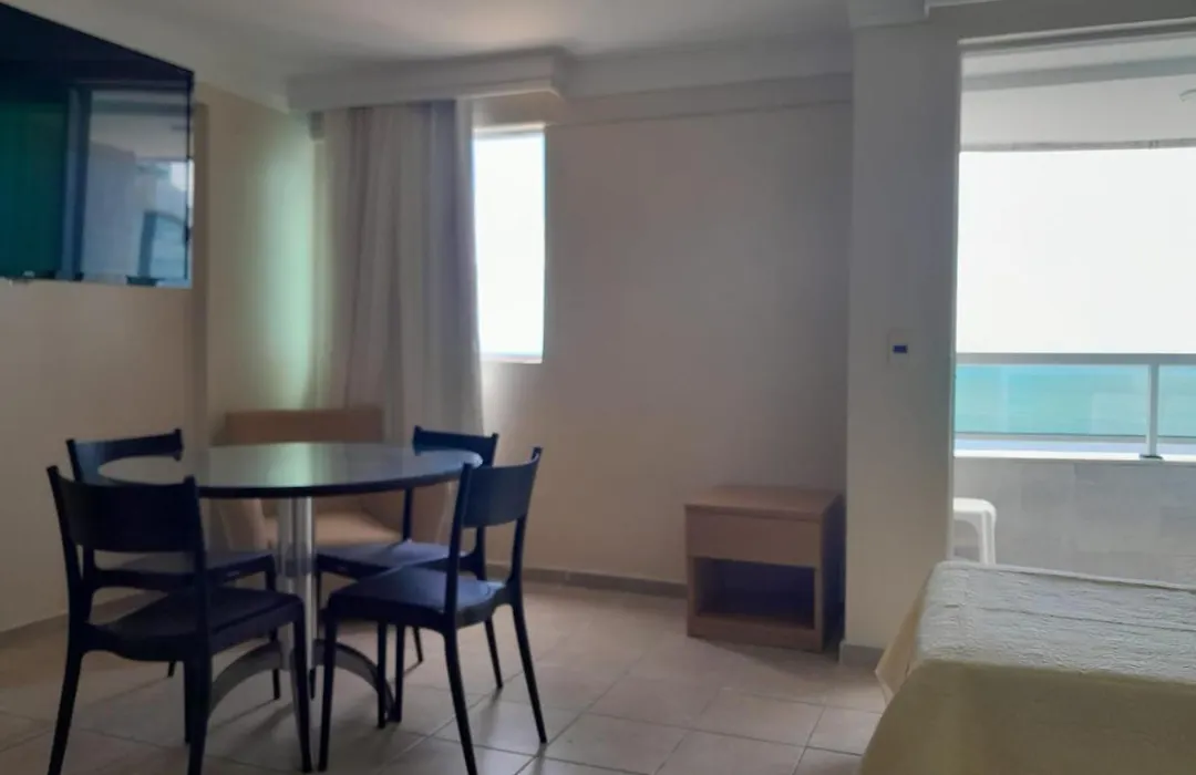 Quarto em condomínio beira-mar-1