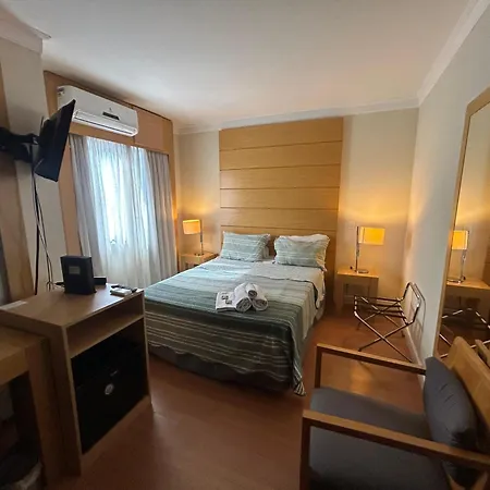 Hotel E suites em frente ao Aeroporto com ar e piscina 1714-2