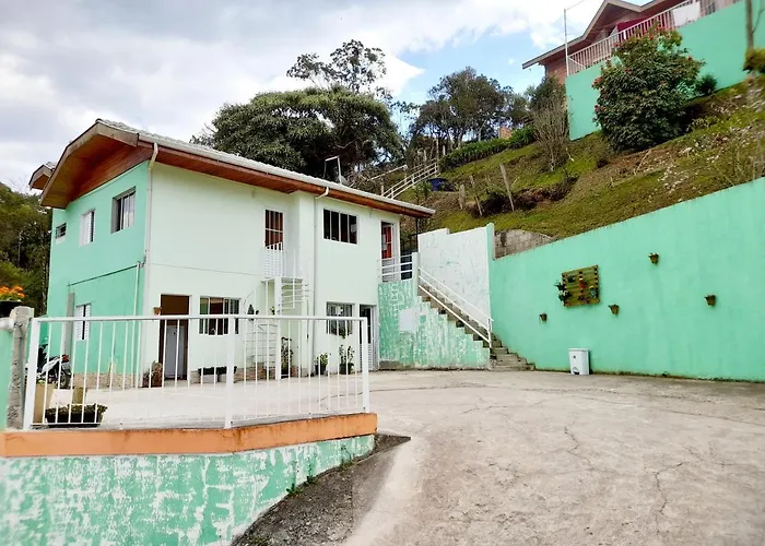 Apartamento Bela Vista - cozinha e suíte Campos do Jordão
