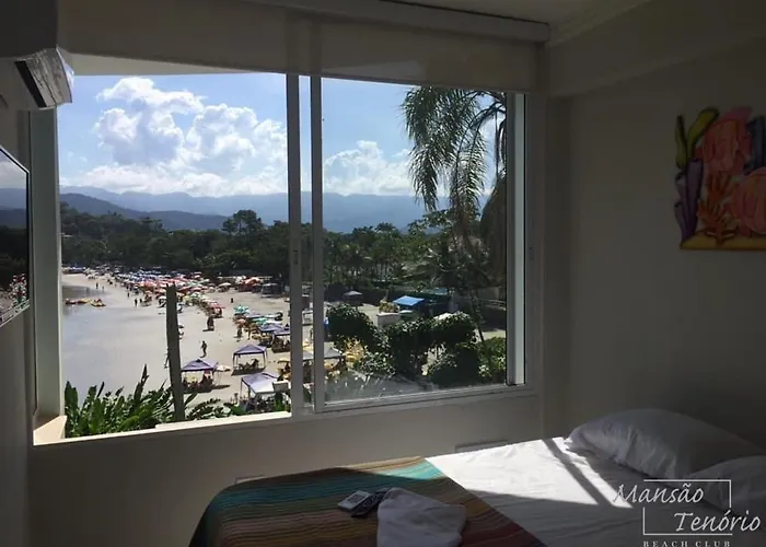 MANSÃO TENÓRIO - Suítes, Estudio ou Cobertura Pé na Areia Ubatuba